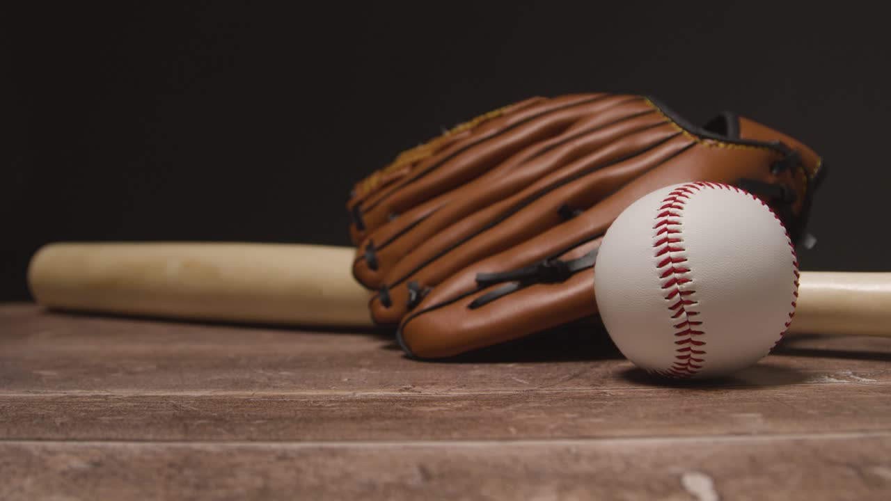 Free stock video Close up studio baseball still life with wooden bat